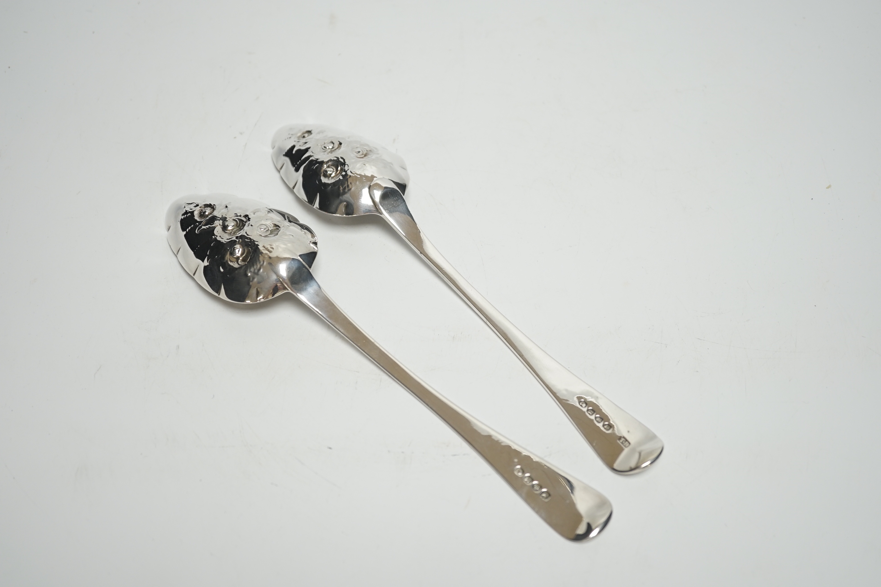 A pair of George III Old English pattern 'berry' spoons, Thomas Wilkes Barker, London, 1812, 22.3cm